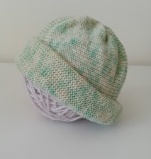 Baby/Toddler beanie hat in soft merino wool .