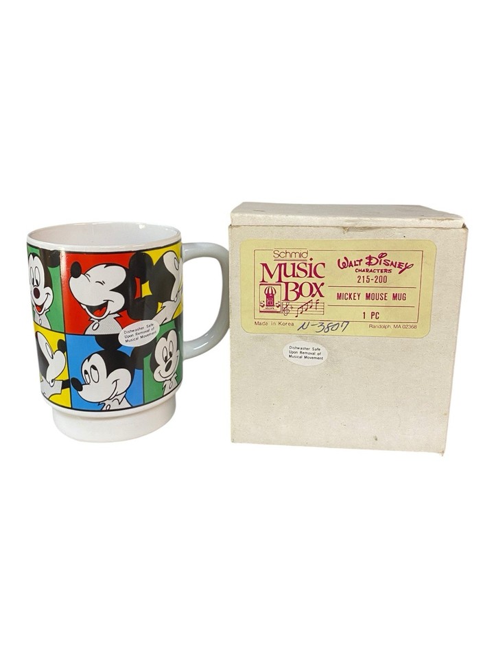 A 1987 Schmid Mickey Mouse music box disguised as a coffee mug — rare Disney collectible that doubles as a conversation piece.
