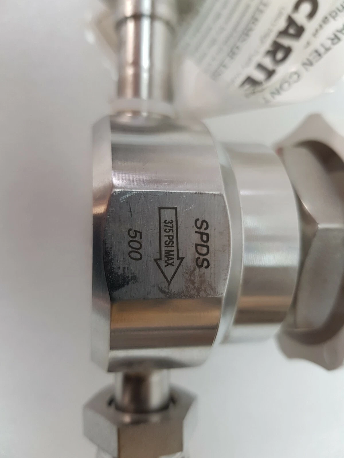SPDS 500 body marking with 375 PSI MAX flow-direction arrow