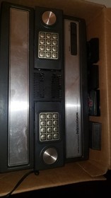 intellivision console with 4 games,