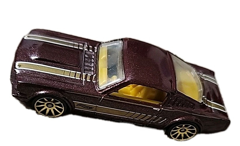 Hot Wheels Mustang ‘85 Ford Mustang Fastback Gold Racing Stripes Bronze Brown 12