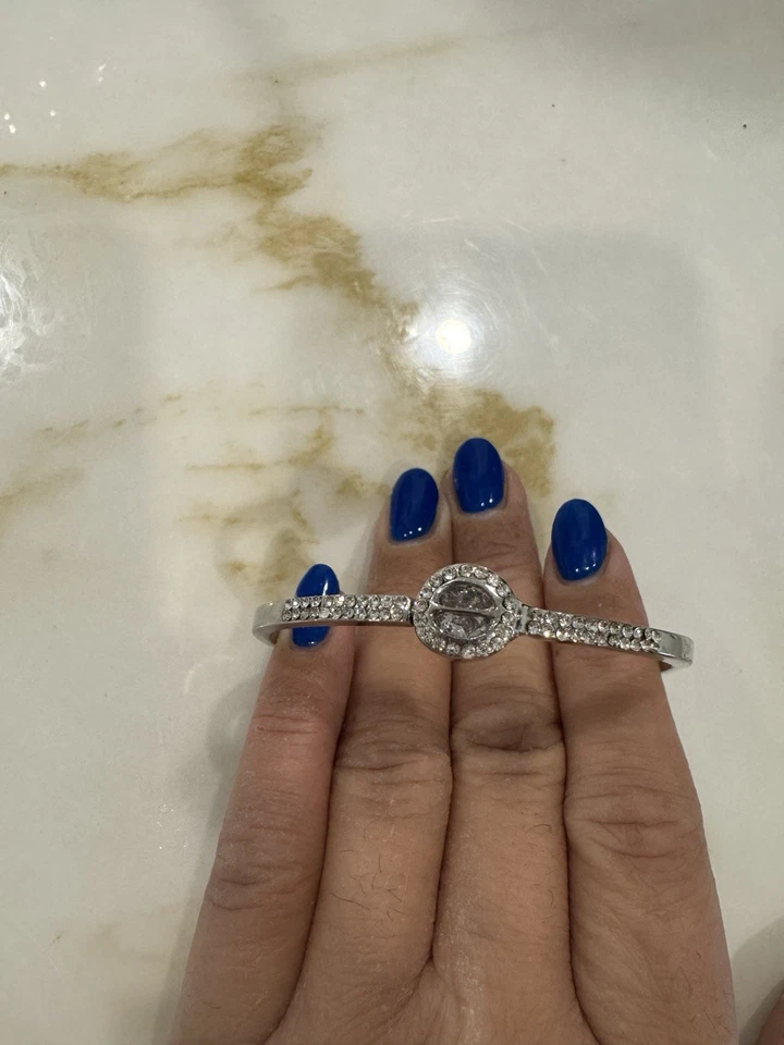 Brazalete con bisagras de cristal de plata Guess Foto 3 de 4