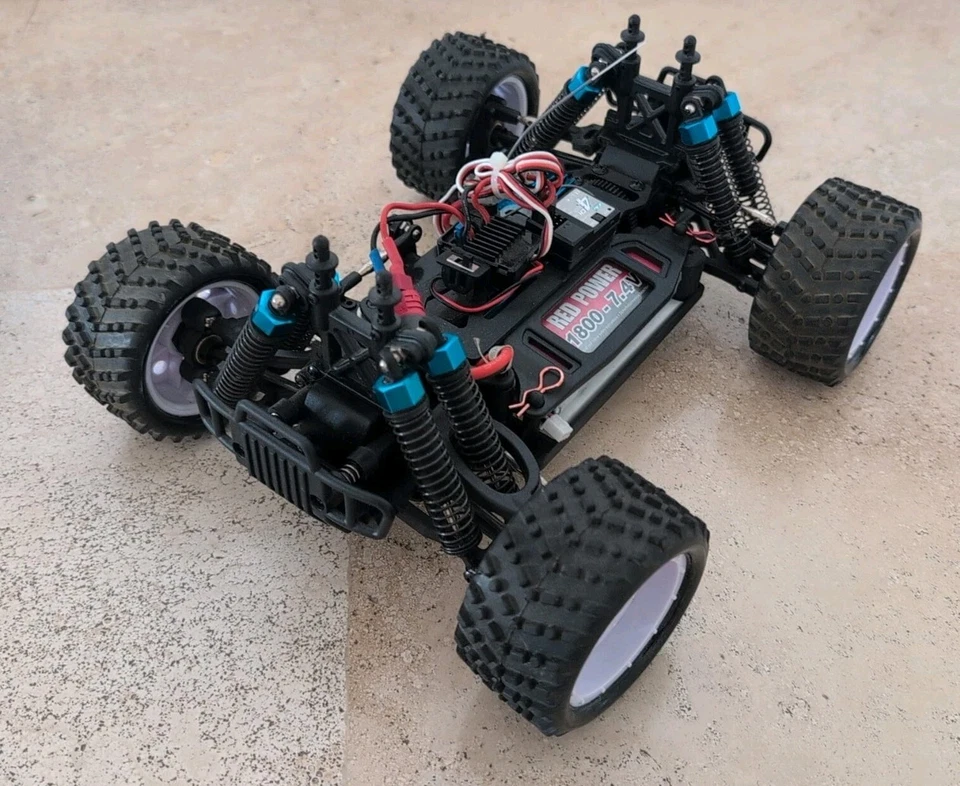AUTO RADIOCOMANDATA 2.4GHZ EXM-16 MONSTER TRUCK 1:16 MOTORE RC-380 RTR HIMOTO  - Immagine 3 di 4