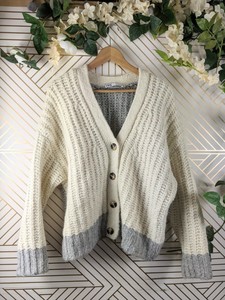 cream colored knit cardigan