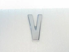 Letter V Emblem New Old Stock Factory Original Rover Brand  359240