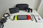 Nintendo Switch Handheld Console 32GB with Neon Yellow/Red Joy-Con + 1 Game