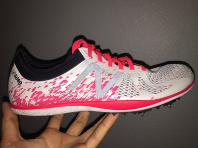 pink new balance spikes