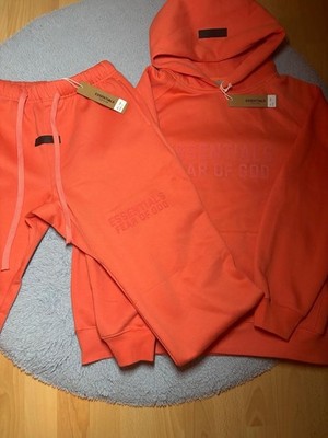 Essen tials Oranger Jogging Anzug Gr. L