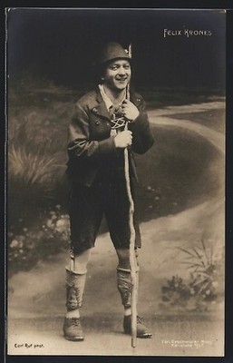 Actor Felix Krones in traditional costume while hiking, postcard
