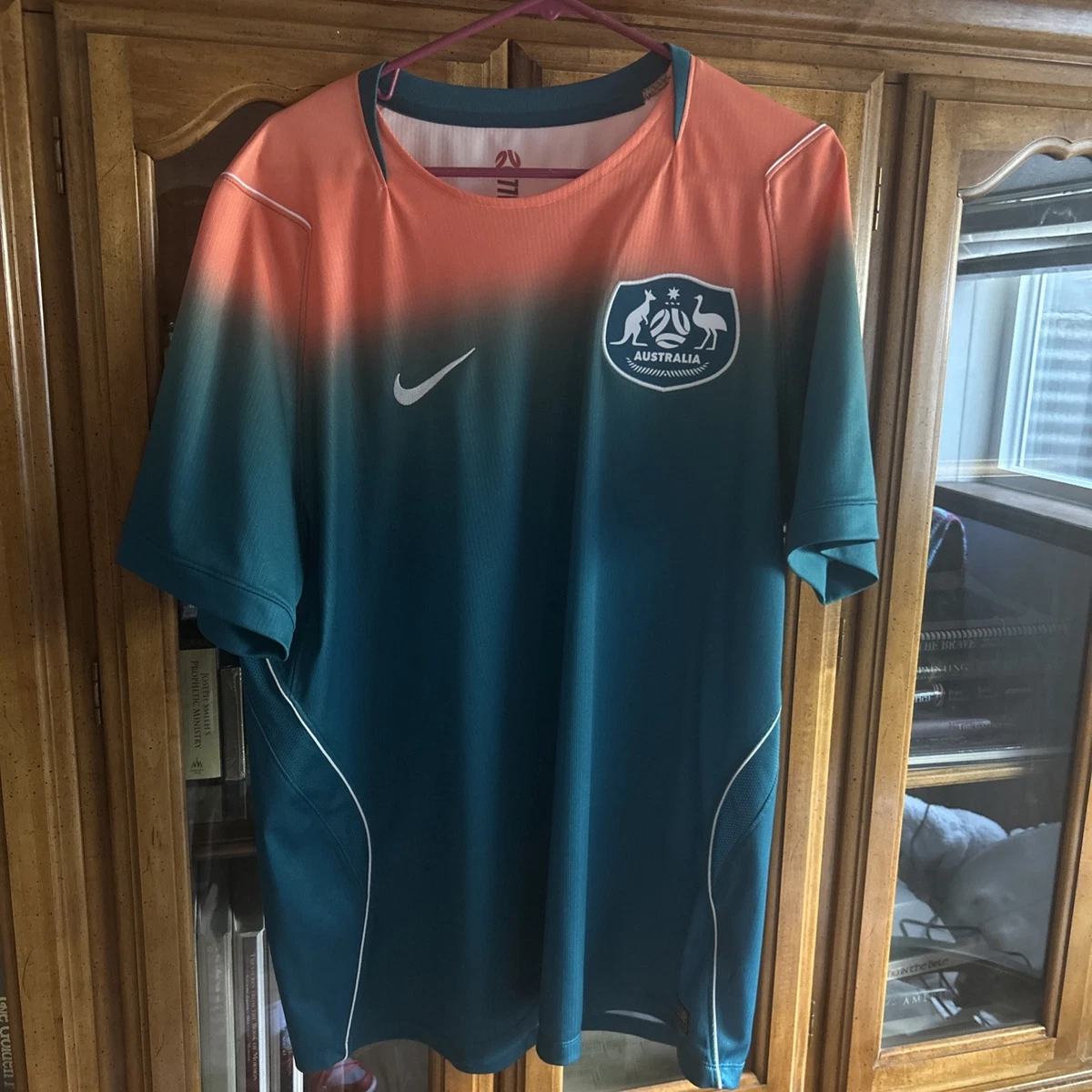 Preços baixos em Equipe Nacional Nike Austrália Roupas e Souvenirs