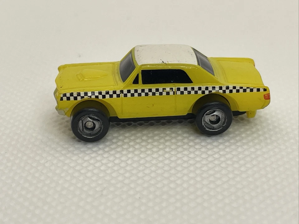 Micro Machine 1965 Pontiac GTO, Yellow w/ Checkerboard, TAXI, Hasbro (Lot MM5) - Image 3 of 4