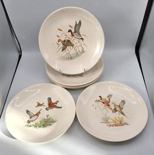 Service de six assiettes plates en faïence de Villeroy & Boch décor gibier XXème