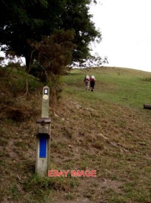 PHOTO  WALKERS ON OFFA'S DYKE PATH THE WALKERS HAVE JUST PASSED A TRACK MARKER A