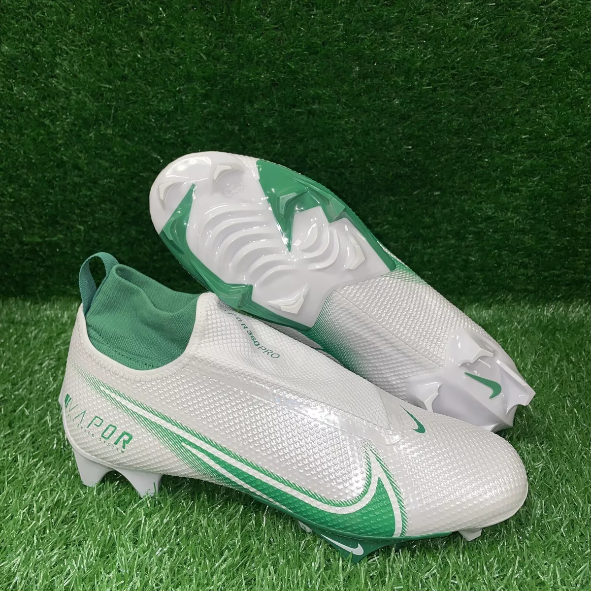White and shop green cleats