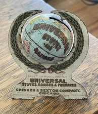 Antique Universal Stoves Ranges Tin Litho Globe Bank 1900s