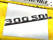 Genuine Mercedes 1987 W126 300SDL diesel rear deck lid PLASTIC silver 1 Emblem