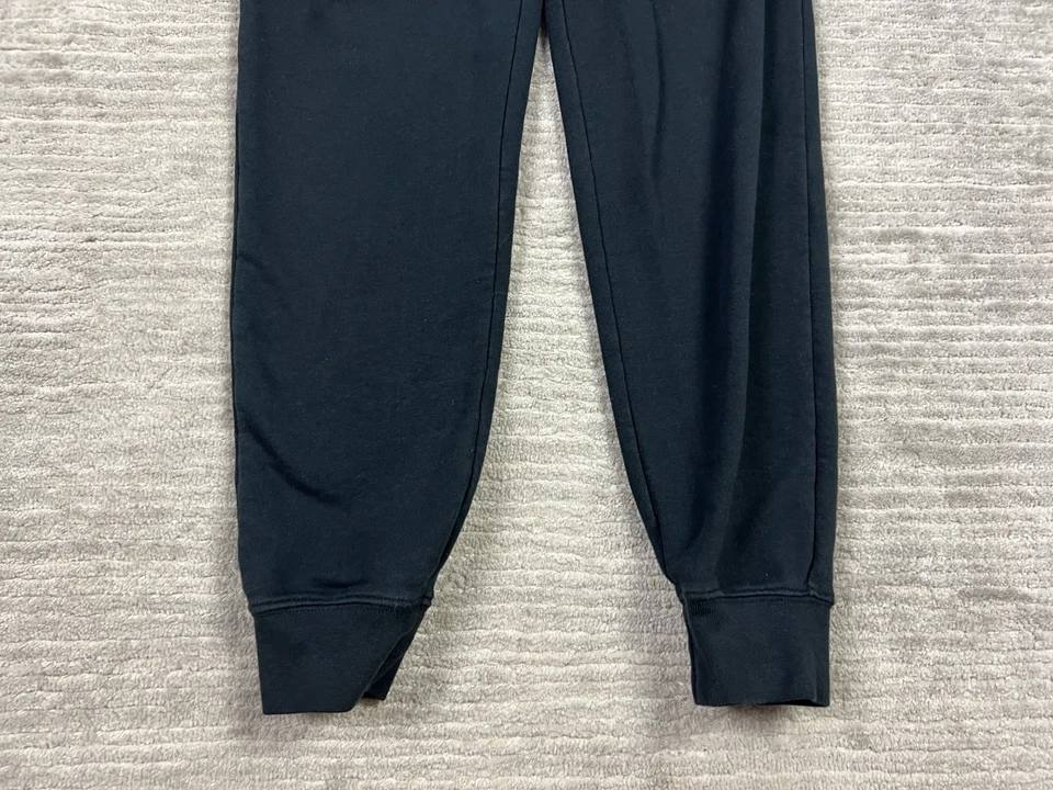 Pantalones deportivos Nike Sportswear Club polar para mujer XS con puños cónicos Foto 3 de 4