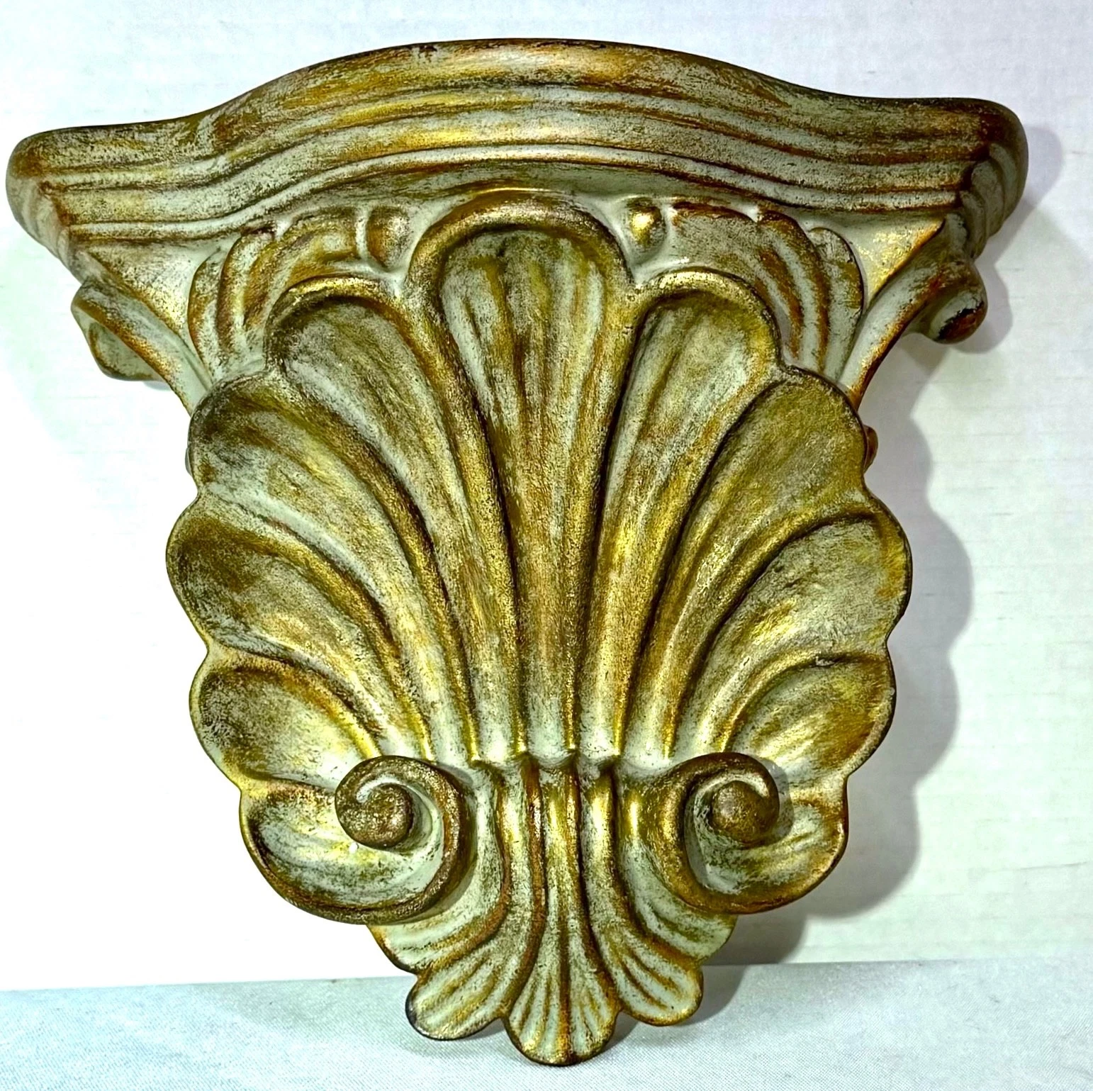 Vintage Decorative Wall Shelf Sconce with an Ornate Seashell Design
