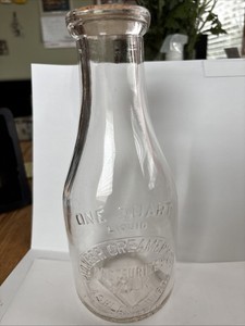 Embossed Pioneer Creamery Co. One Quart Dairy Bottle. Ashland Wi.