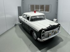 Tomica Limited Vintage Nissan Cedric (Japanese Highway Police) 1:64