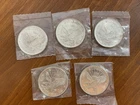 Lot of (5) 1986 Sunshine Mining 1 Troy ounce .999 fine Silver Eagle round