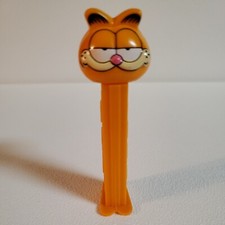 Garfield Cat Pez Dispenser Made in China Orange White Eyes Empty Used