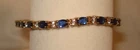 Vntg Avon Gold Tone Blue Sapphire Rhinestone 7” Costume Jewelry Tennis Bracelet