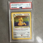 1999 POKEMON FOSSIL #4 DRAGONITE-HOLO PSA 4