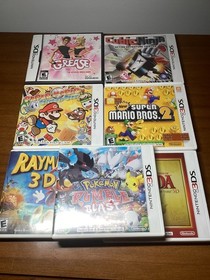 Nintendo 3DS 2GB Handheld System with Nerf Case, Charger, and Games: Cosmo Black