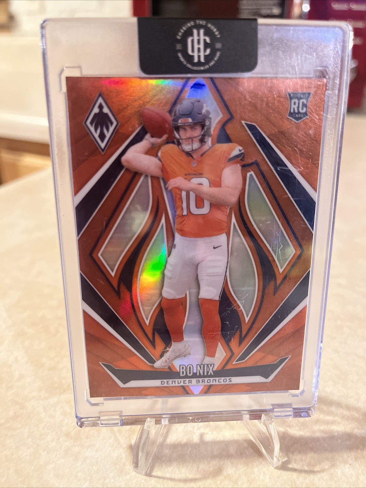 2024 Panini Phoenix Rookies Bo Nix #159 Orange (RC) Denver Broncos