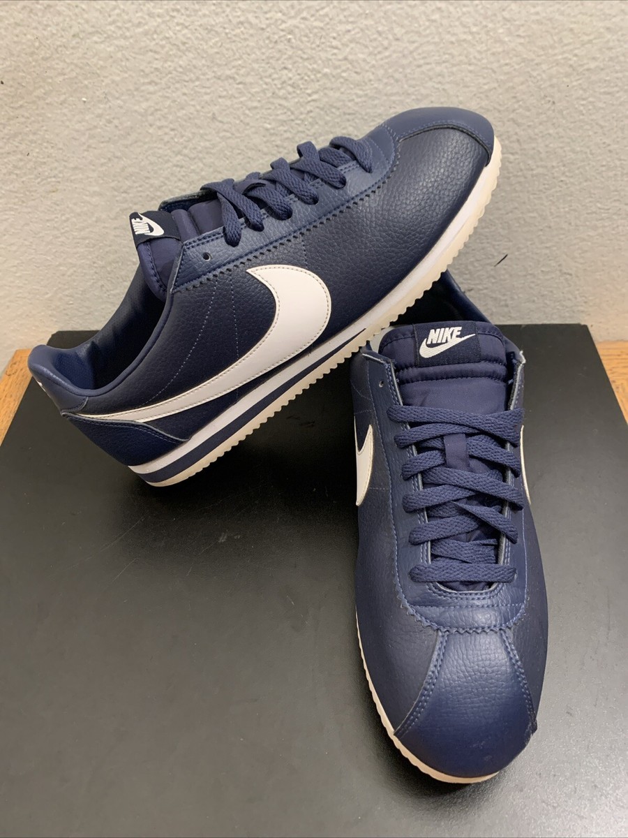 navy blue leather nike cortez