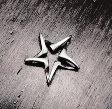 Retired James Avery Floating Star Pendant