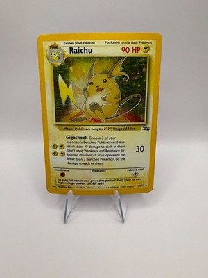 RAICHU 14/62 Fossil 1st Edition Holo Rare
