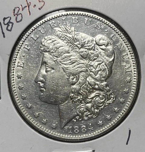 1884-S MORGAN SILVER DOLLAR, AU DETAILS.
