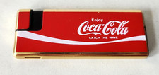 BRIQUET COCA COLA ENJOY COCA COLA "CATCH THE WAVE" BRIQUET À GAZ LEO-5 UTILISÉ