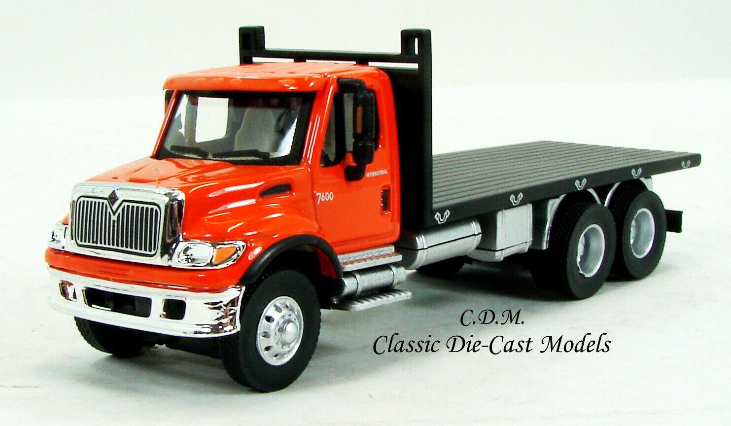 International 7600 3 Axle Orange Flatbed Truck HO 1/87 Scale Walthers