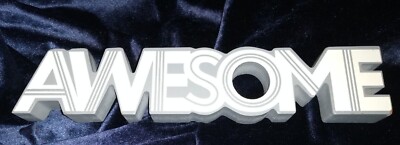 It's  ''AWESOME'' in wood 3d White letters with grey highlighted lines and edges