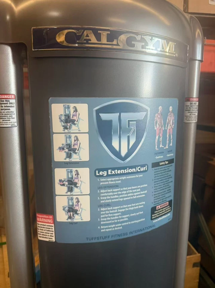 Máquina combinada de extensión/rizo de piernas Tuff Stuff Cal Gym con pila de peso de 200 lb Foto 3 de 4