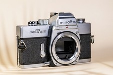 Minolta SRT202 camera, light meter works, viewfinder is clean