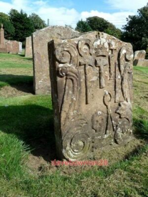 PHOTO  A BLACKSMITH'S GRAVE THIS FINE SYMBOLIC STONE CARRIES THE TOOLS OF THE BL