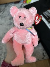 Sherbet pink Bear Ty Beanie Baby, a collectible plush toy