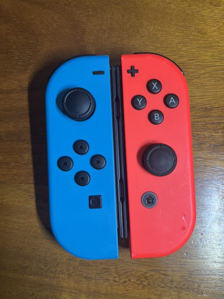 Nintendo Switch 32GB Handheld Console Neon Red/Blue JoyCon Dock And