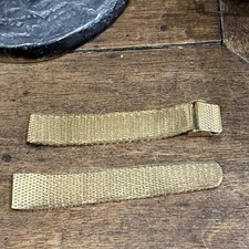 braided and gold metal watch strap 1950s era
