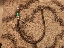 BrassCraft 1/2 in. FIP x 1/2 in. FIP x 30 in. Braided Polymer Faucet Supply Line