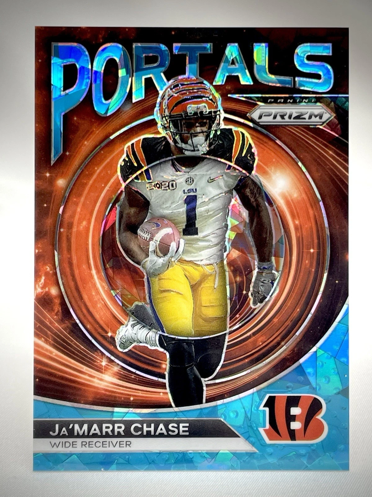 2023 Panini Prizm Ja’Marr Chase #PO-6 Blue Ice Portals /99 Bengals