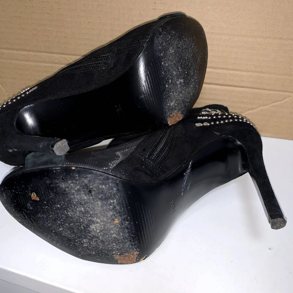 Botas Guess para mujer Polli de tela negra punta abierta al tobillo, estilo malla 71/2 M. Foto 3 de 4