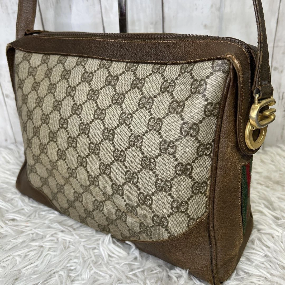 Sac à bandoulière GUCCI Sherry Line GG Supreme marron/or