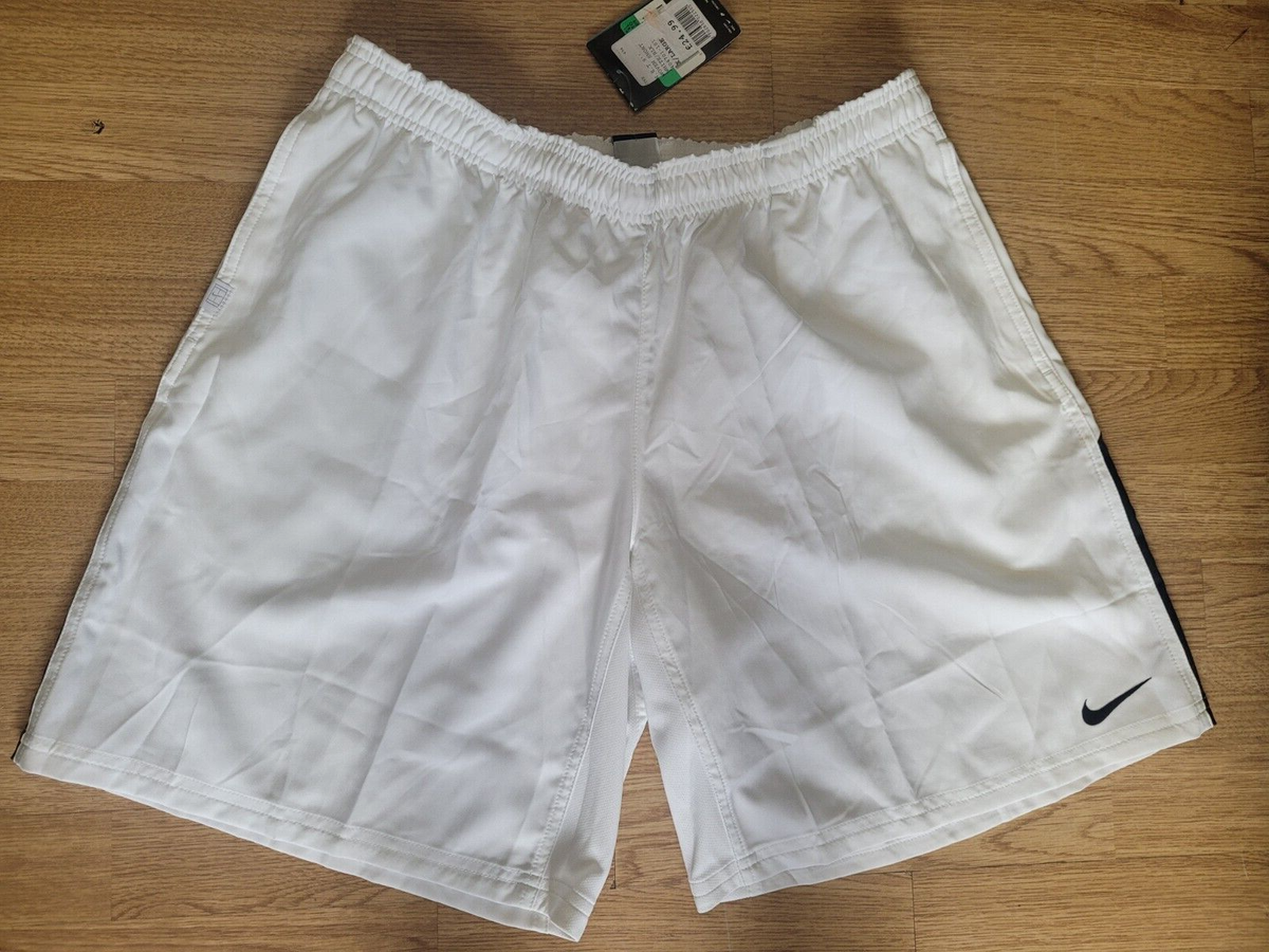 white nike woven shorts
