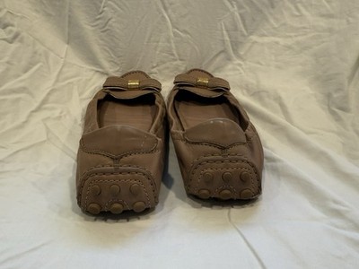 The Louis Vuitton Ballet Shoes Boast a Luxurious Gold Bow Center Clasp - Used