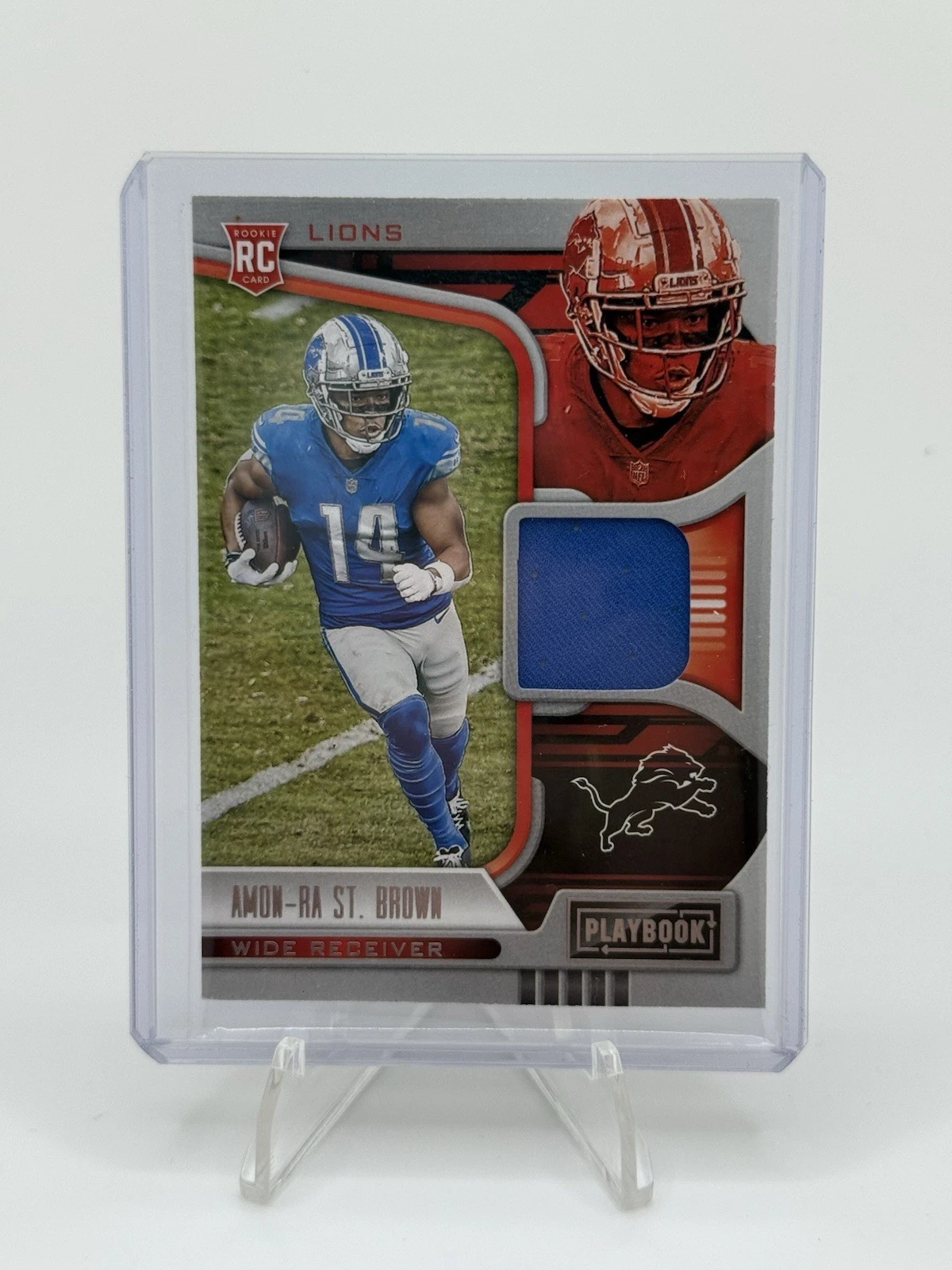 Amon-Ra St. Brown Panini Playbook Rookie Materials #ASB Base